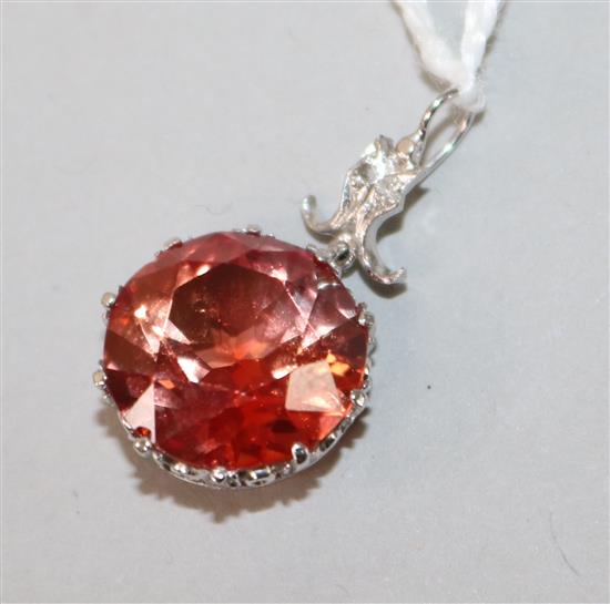 A white metal, synthetic sapphire and diamond drop pendant, overall 24mm.